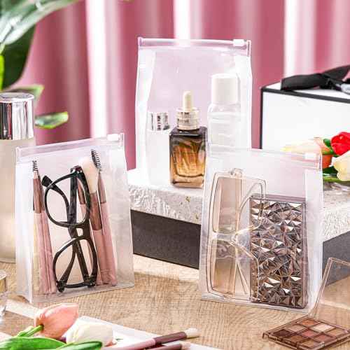 Xuniea 100 Pcs Mini Clear Makeup Bag PVC Small Travel Toiletry Organizer Pouches Bulk Waterproof Transparent Plastic Cosmetic Bag with Zipper for Women Men Travel(5.1'')