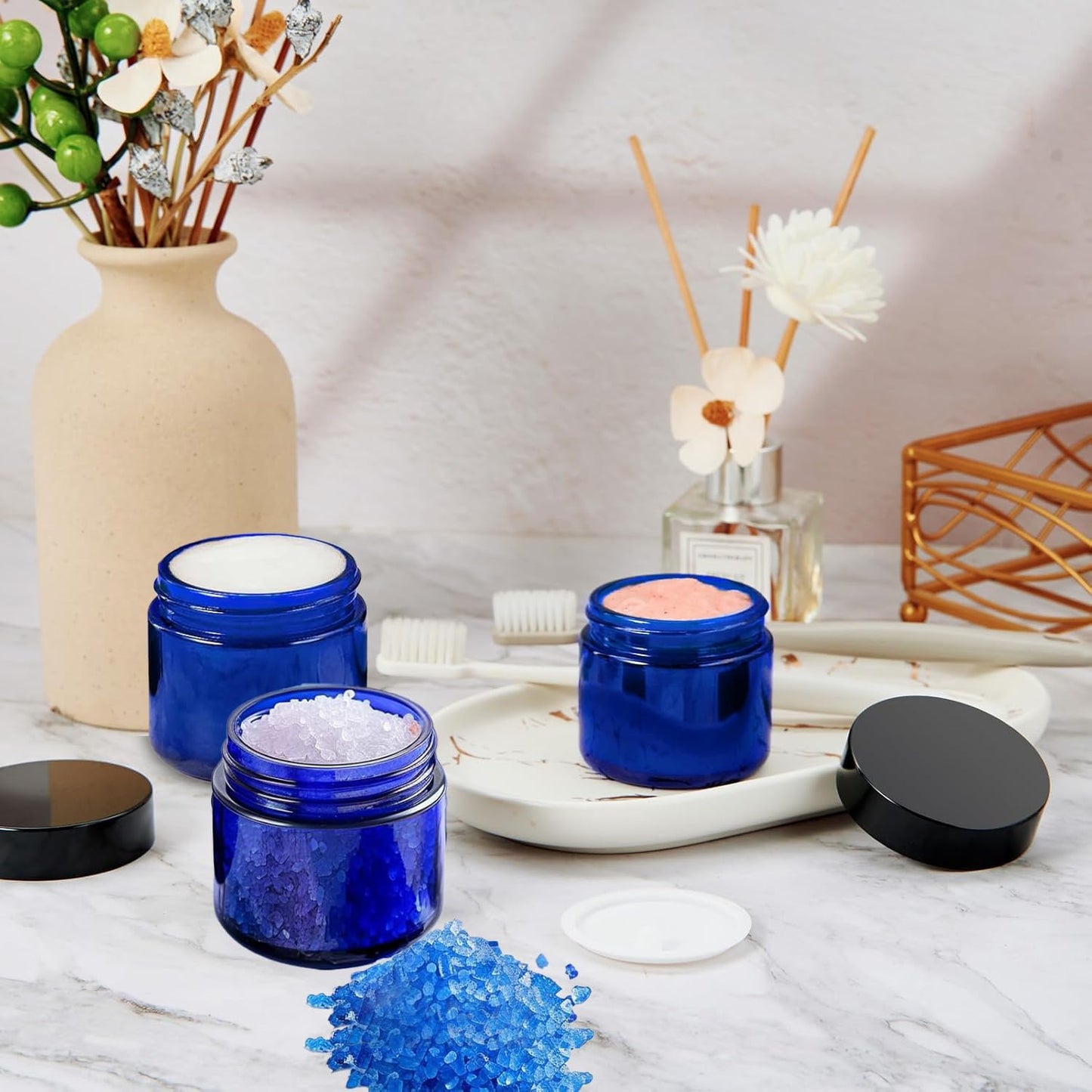 BPFY 24 Pack 2 oz Round Blue Glass Cosmetic Jars with Inner Liners and Black Lids, Travel Jars, Refillable Containers for Makeup, Cream, Lotion, Sugar Scrubs, Eye Shadow, Slime, Paint, Jewelry