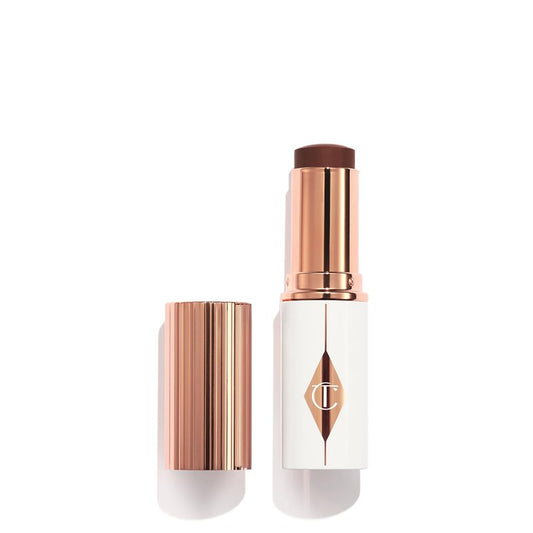 Charlotte Tilbury Unreal Skin Tint & Sheer Glow Hydrating Foundation Stick - Cream Foundation Makeup with Sheer-to-Light Coverage & a Buildable Formula - Blurring, Smoothing & Nourishing - 16 Deep
