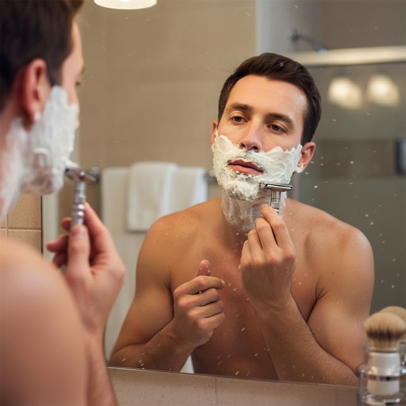 6-speed adjustable dual-blade safety razor with 10 platinum-coated stainless steel blades. Includes optional stand. Comes with complimentary travel pouch. (Silver)