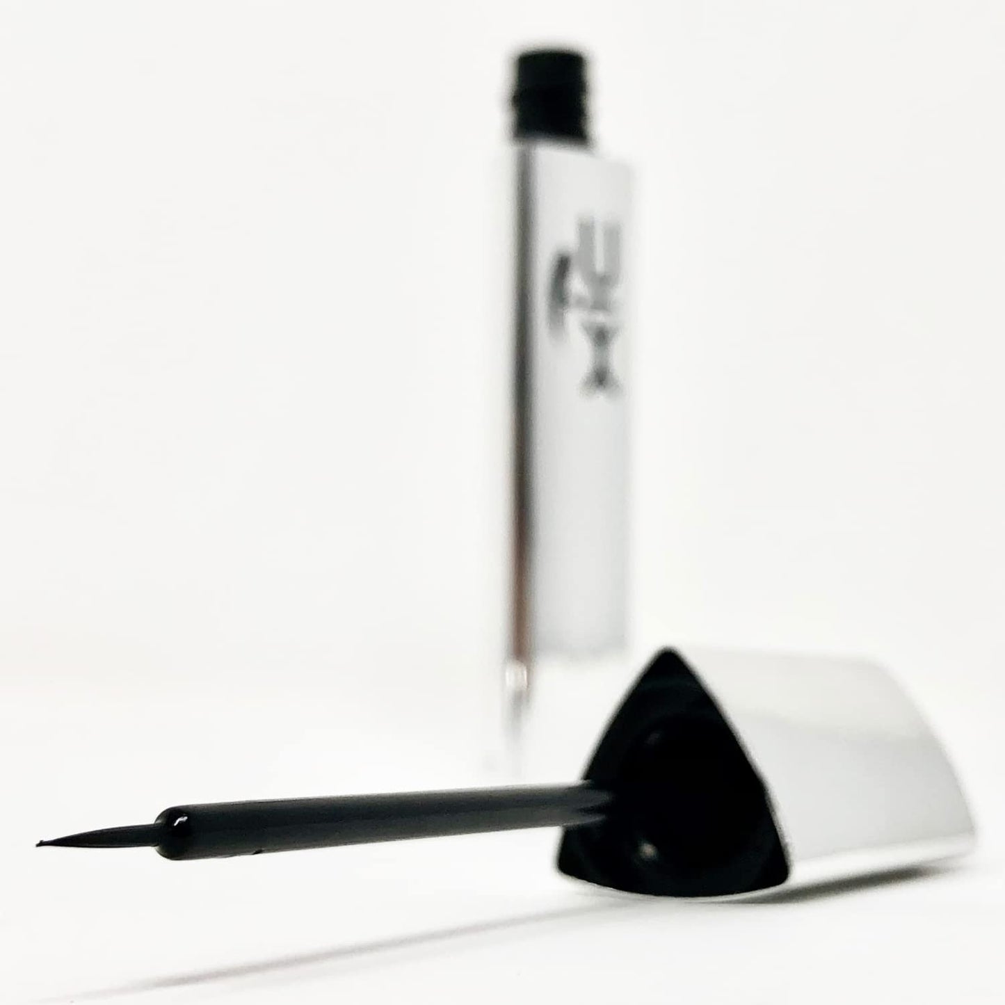 XiC Glam. Liquid Eyeliner, Intense Black Color, Waterproof and with Ultra Fine Brush. XiC Sexy Black Eyeliner, 0.24 fl oz.