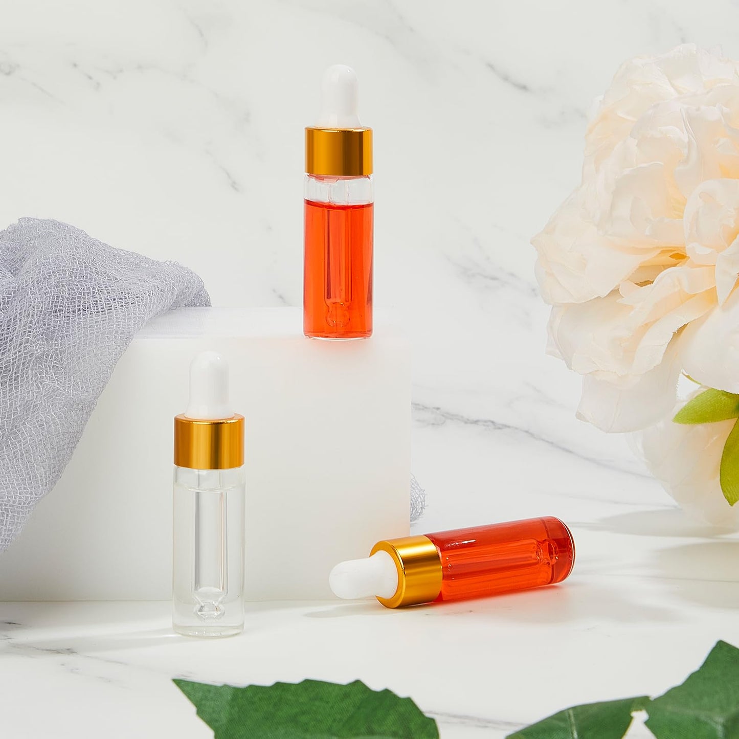 Didaey 200 Pcs 5 ml Mini Glass Oil Dropper Bottle Bulk, Clear Essential Small Empty Bottles Sample Containers Perfume Liquid Vials with Cap for Traveling (Champagne Gold)