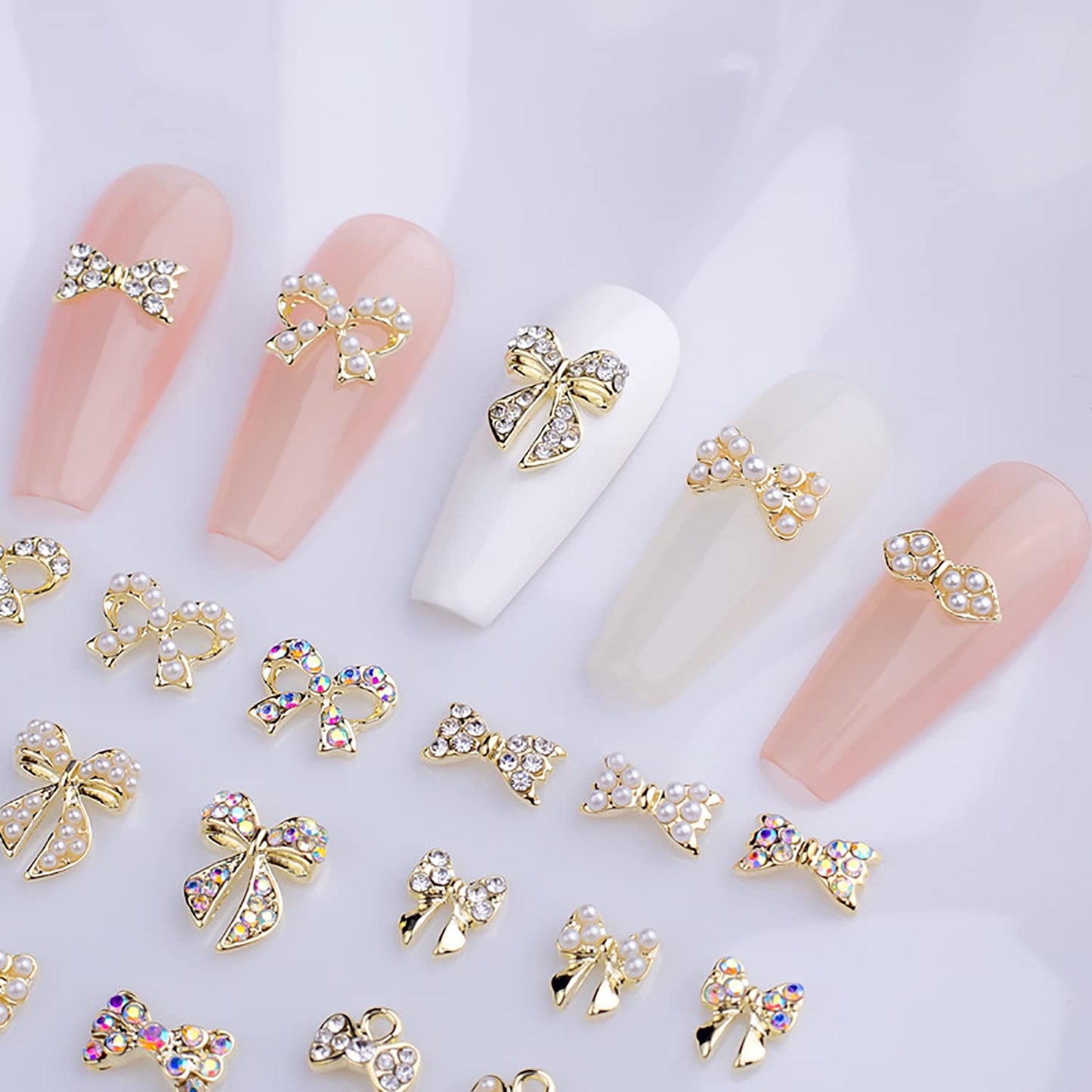JERCLITY 33 Pieces Gold Alloy Bow Charms for Nails Bow Nail Charms Gems Bowknot Nail Studs Inlaid Pearl Clear Iridescent Rhinestone for Women Nail Art