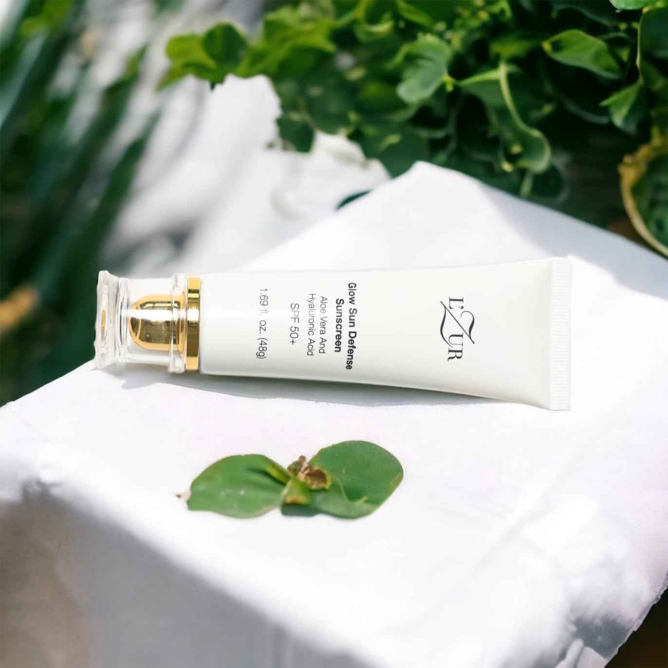 L'Zur Face Sunscreen SPF 50+ Glow Sun Defense Lotion Non-Greasy Ultimate Protection with Aloe Vera, and Hyaluronic Face Moisturizing for Radiant Skin - 1.69-Fluid Ounce