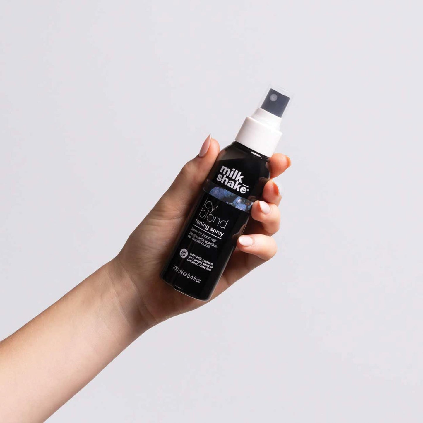 milk_shake icy blond toning spray | leave-in toner with black pigment to cool brass and refresh icy tones in platinum blonde hair | adds softness, shine, and detangling | 3.4 fl oz / 100 mL