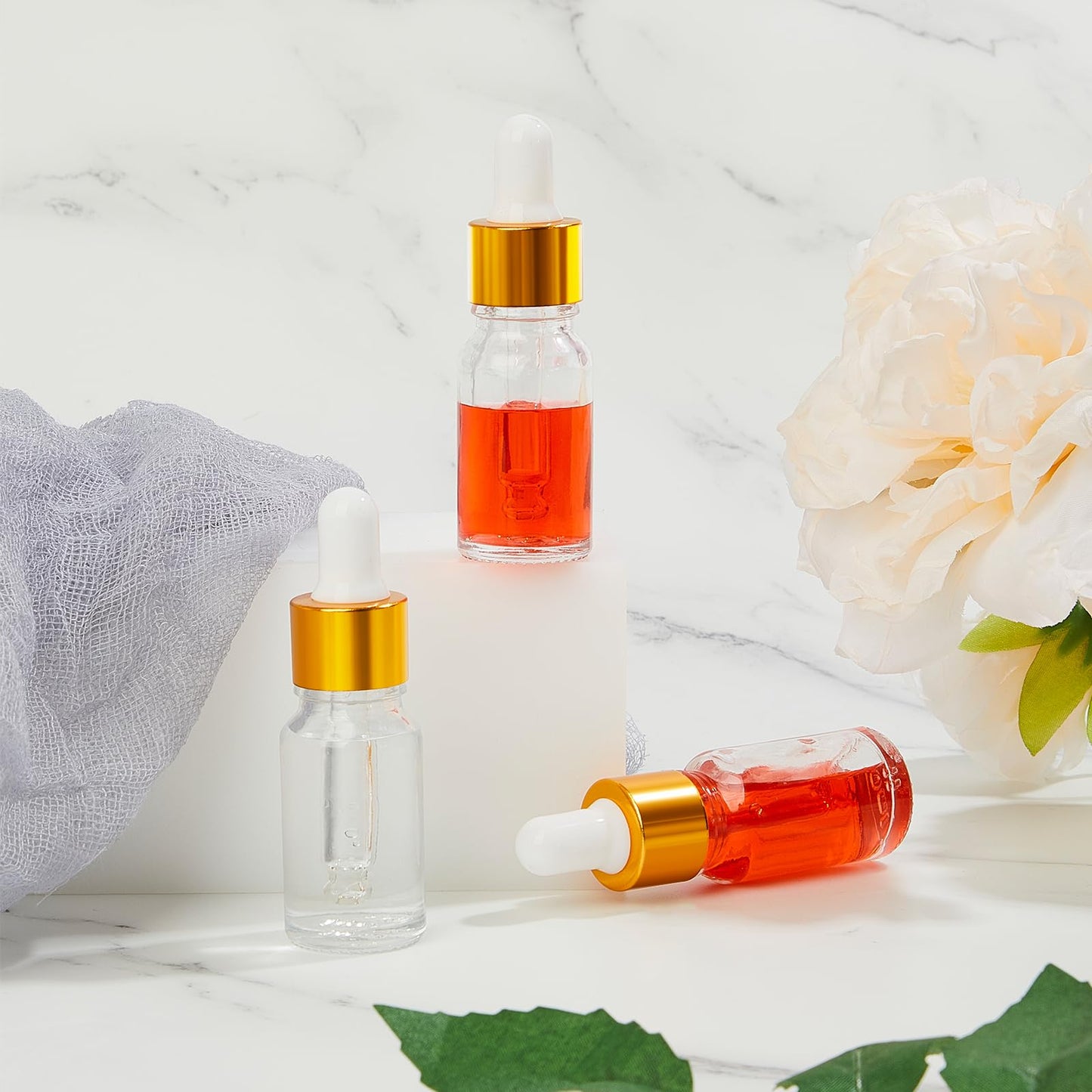 Didaey 100 Pcs 1/2/3/5/10/15 ml Mini Glass Oil Dropper Bottle Bulk, Clear Essential Small Empty Bottles Sample Containers Perfume Liquid Vials with Cap for Traveling (10 ml,Champagne Gold)