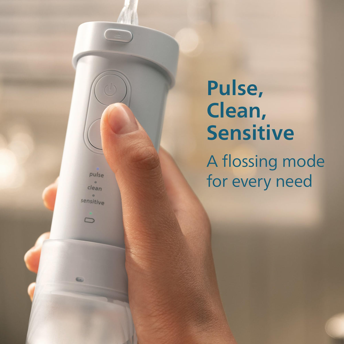 Philips Sonicare Compact Flosser 1000, Portable Water Flosser with 3 Flossing Modes, IPX7 Waterproof Oral Irrigator, Travel Friendly, Blue, Model HX3333/24