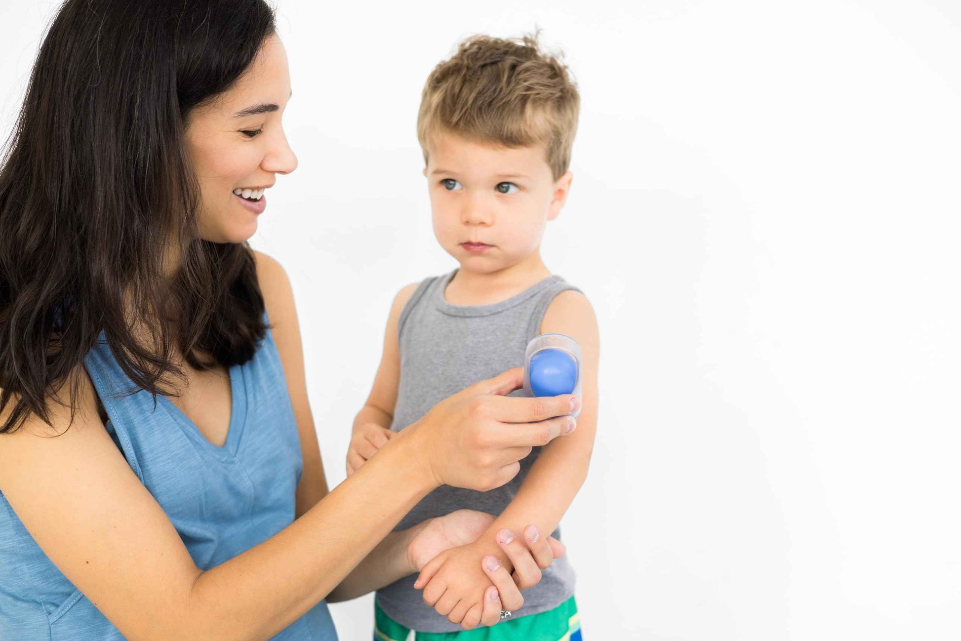 Ubbi Sunsqueeze Sunscreen Applicator, Refillable Roll On, Soft Silicone Bristles for Babies and Toddlers, Easy to Clean, Dishwasher Safe, Holds 3.38 Fluid Oz, Blue & Yellow 2 Pack