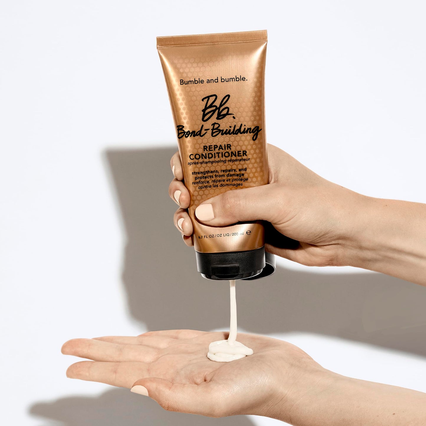 Bumble and bumble. Bond-Building Hair Repair Conditioner | Strengthens and Prevents Breakage | Smooths Frizz, Adds Shine | For Damaged Curly, Wavy, Straight Hair Types, 2 Fl Oz