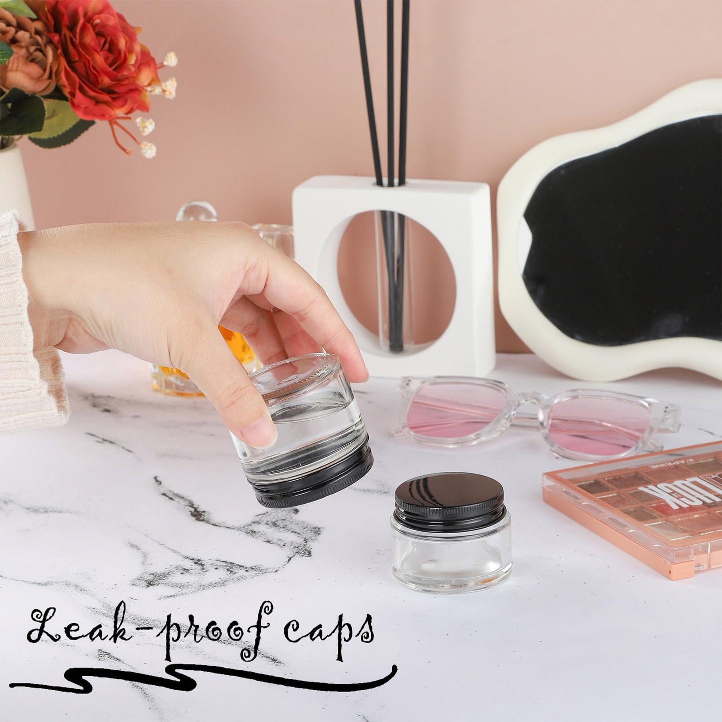RAMFIYN 24 Pack 2oz Clear Glass Jars Small Glass Containers with Black Metal Lids Empty Cosmetic Jars with Inner Liners and Lids Clear Glass Lotion Jars with Labels for Traveling