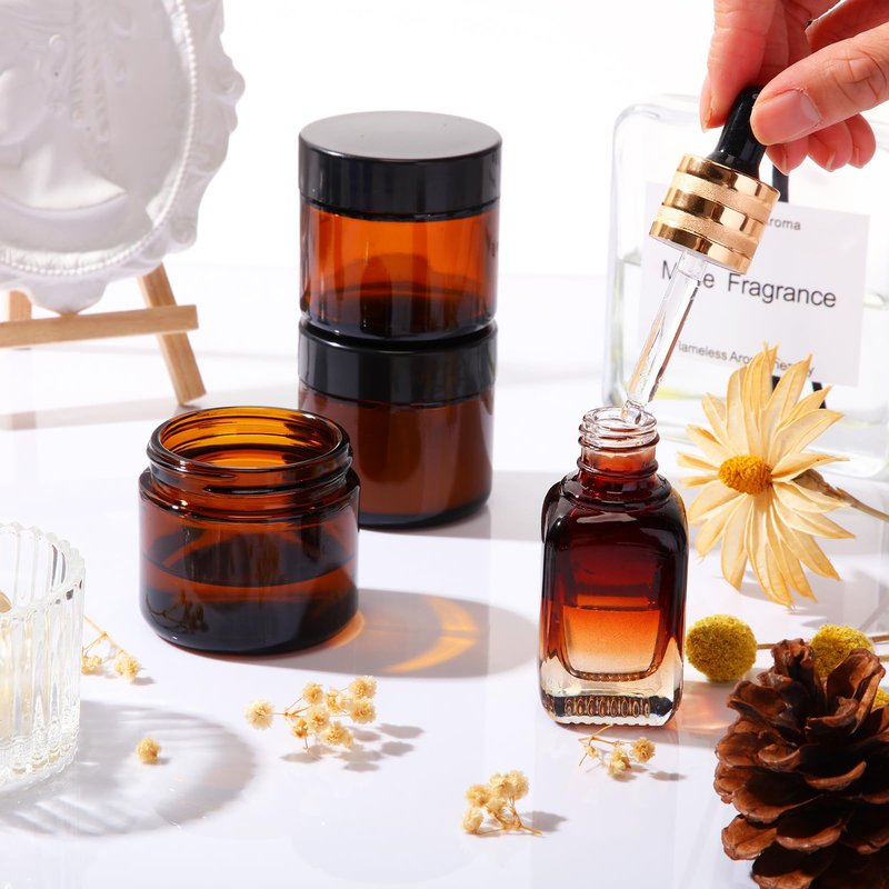Layhit 24 Pcs 2 oz Glass Jars with Lids Bulk, Small Jars Containers Travel Storage Jar with Inner Liners Labels for Lotions, Cream, Lip Balm (Amber,Black Lid)