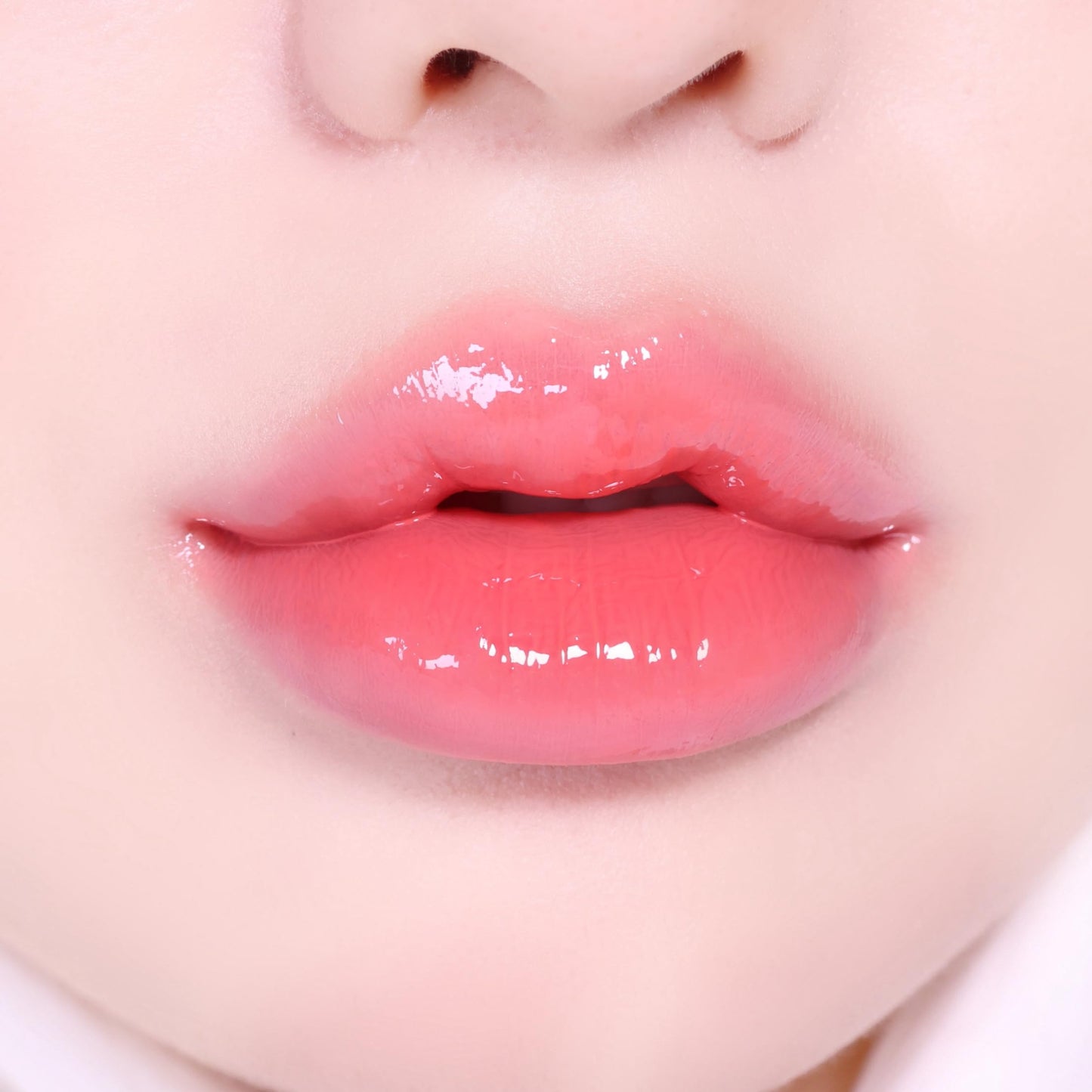 TONYMOLY Get It Tint Glaze Balm – Sparkling Coral Hydrating & Plumping Tinted Lip Balm – Glow Lip Gloss Stick with Glossy Finish, Moisturizing Lip Crayon for Smooth, Soft, and Radiant Lips