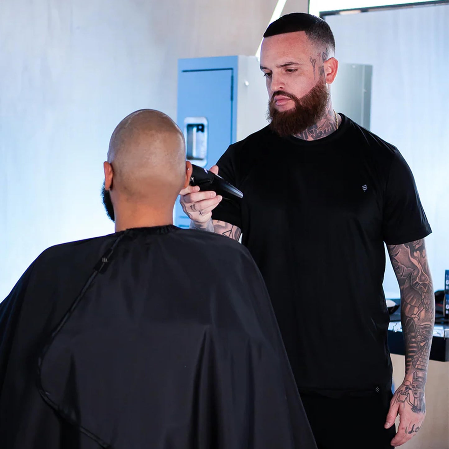 Barber Strong The Junior Hands-Free Barber Cape for Kids, Hair Repelling and Static-Reducing Material, Flexible Elastic Neckband, Water Resistant Fabric, Oversized for Complete Coverage - Black