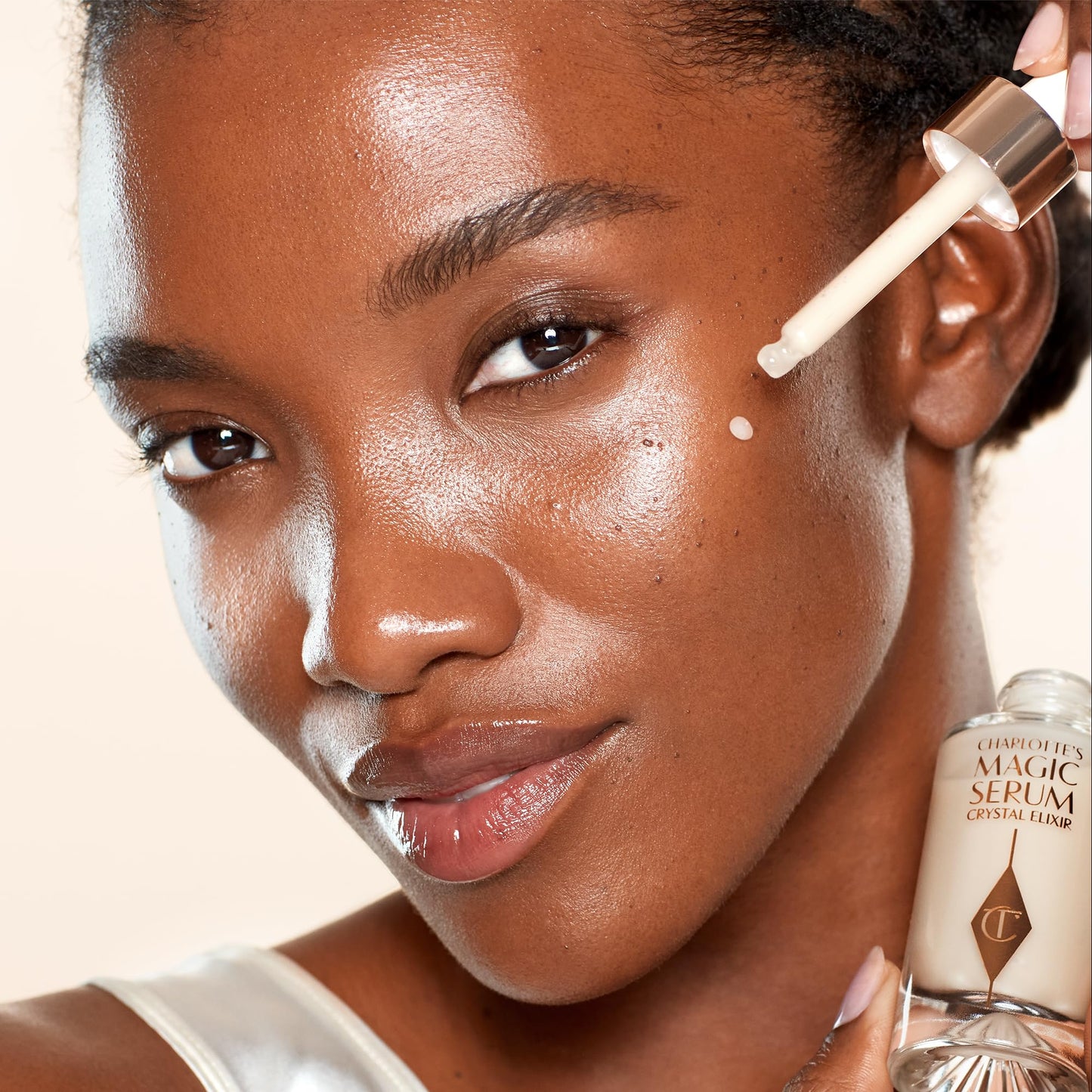 Charlotte Tilbury Magic Serum Crystal Elixir - Anti Aging Skincare Set - Face Firming Peptide, Brightening Vitamin C Serum & Glow-Boosting Niacinamide - Perfect for Gifting & Makeup Pairings (30ml)