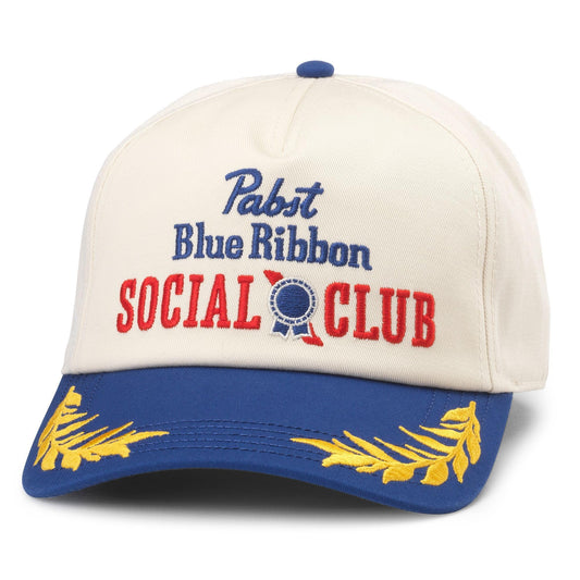 AMERICAN NEEDLE Pabst Blue Ribbon Beer Club Captain Adjustable Snapback Baseball Hat, Ivory/Navy (24002A-PBC-INVY)