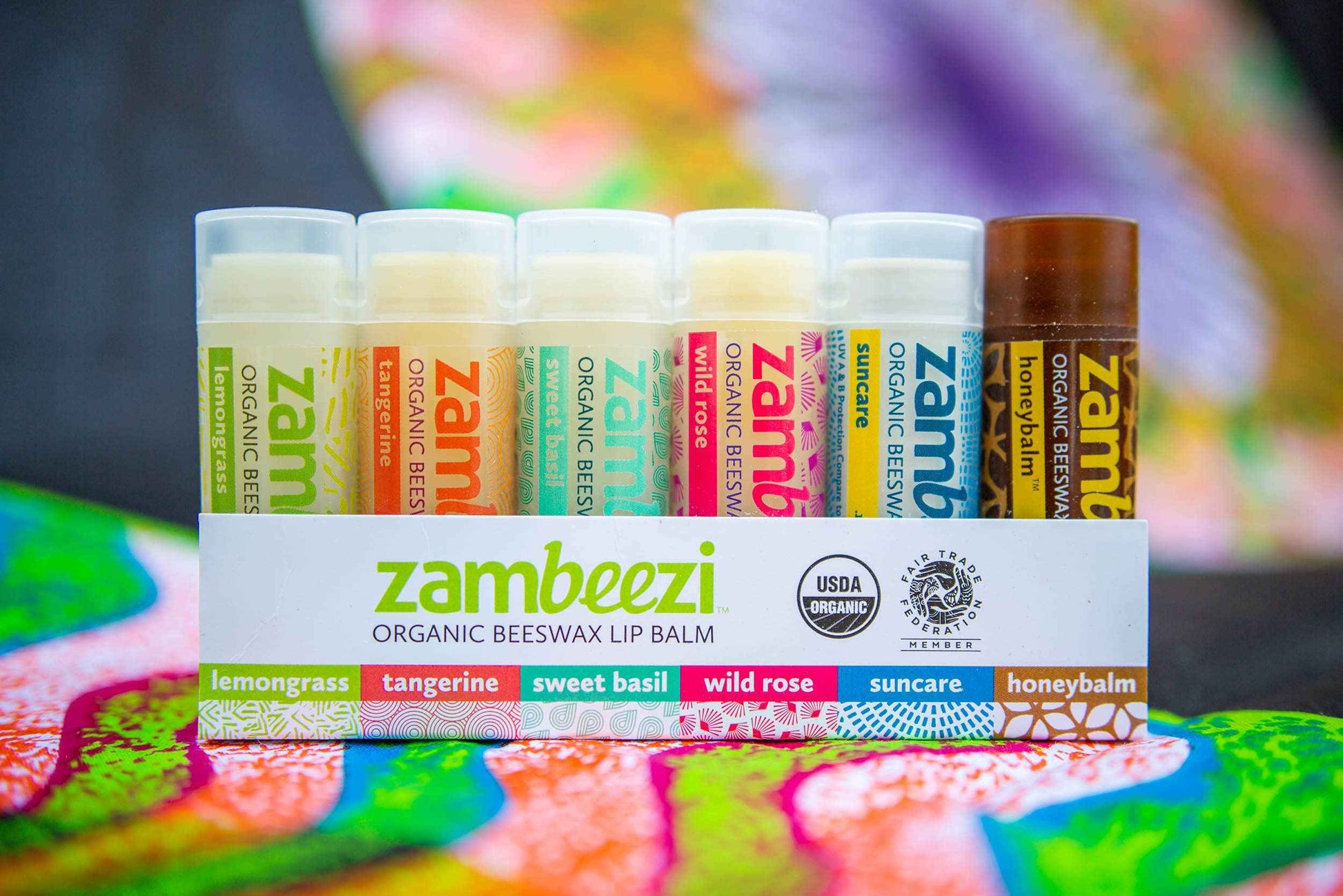ZAMBEEZI Fair Trade, Organic Beeswax Lip Balm - Variety 6 Pack (Lemongrass, Tangerine, Wild Rose, Sweet Basil, Suncare and Honeybalm) - Ethically Sourced
