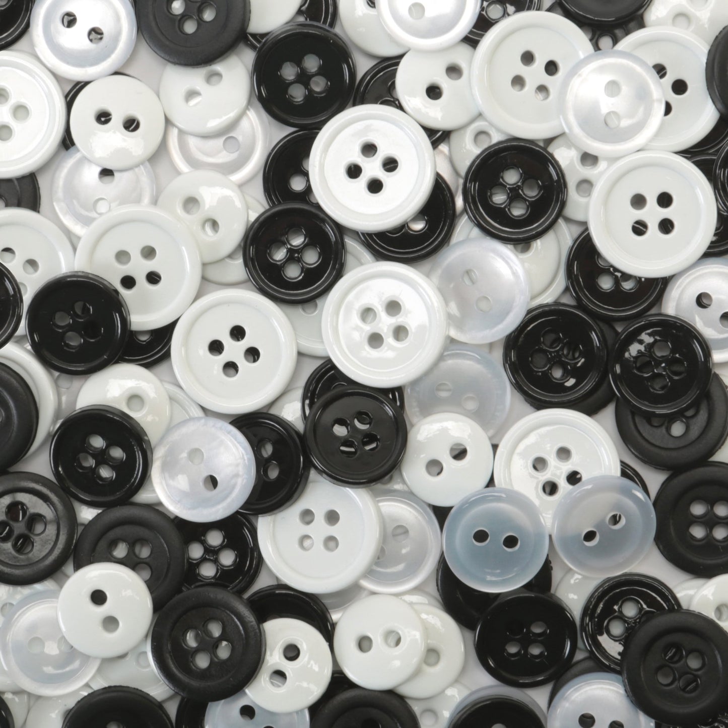 Blumenthal Lansing Black, White and Pearlized Round Buttons