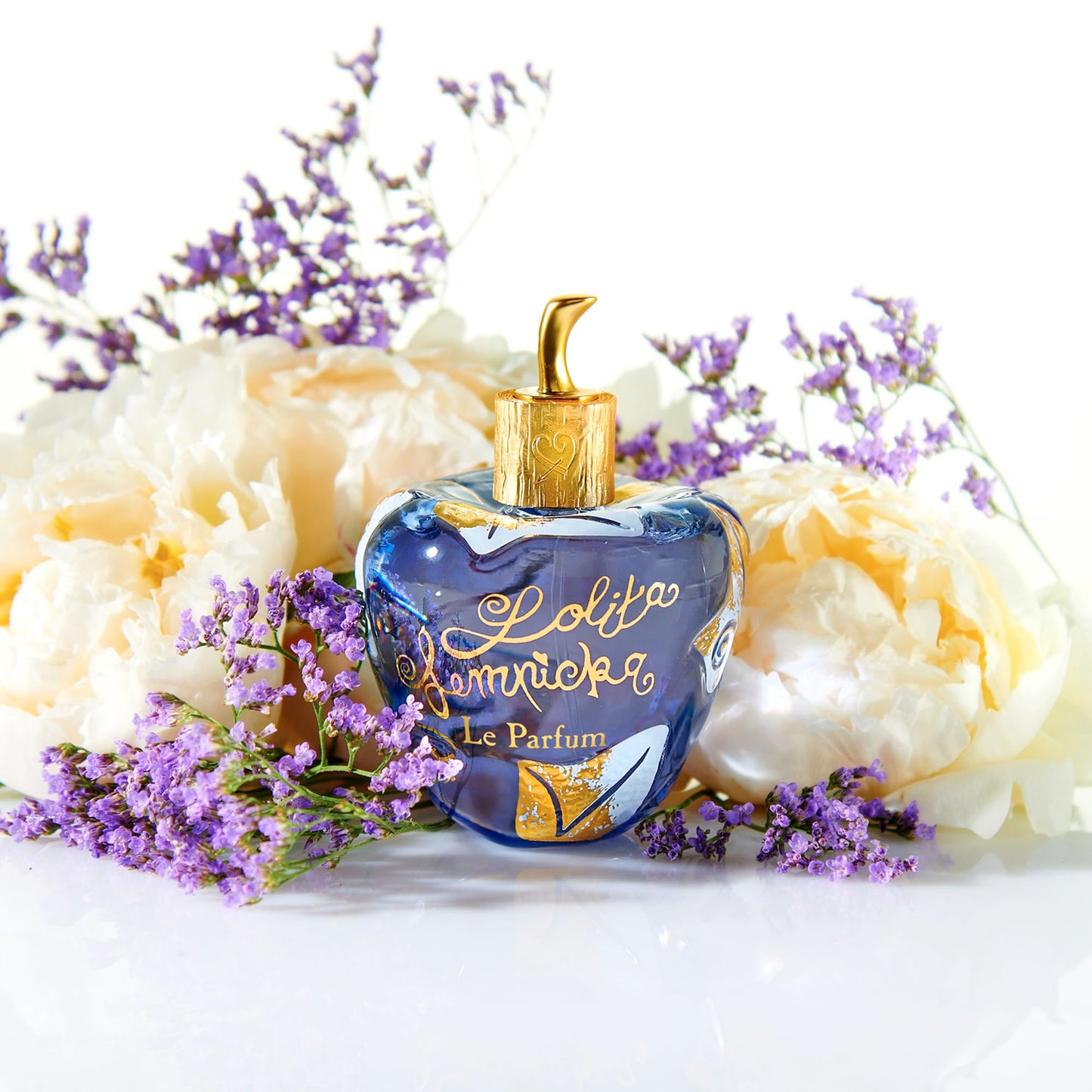 Lolita Lempicka Le Parfum Eau De Parfum Spray for Women - Notes of Licorice, Violet, & Anise - Ideal for Daily Wear and Special Events - Travel Size .50 Oz