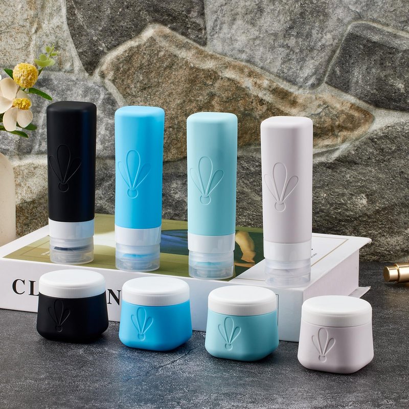 INSFIT travel bottles for toiletries 8 Pack, Leak proof Travel Size Toiletries Containers with toiletry bag, Squeezable Silicone Bottles & Cream Jars, Travel Essentials BPA-Free kit for Shampoo