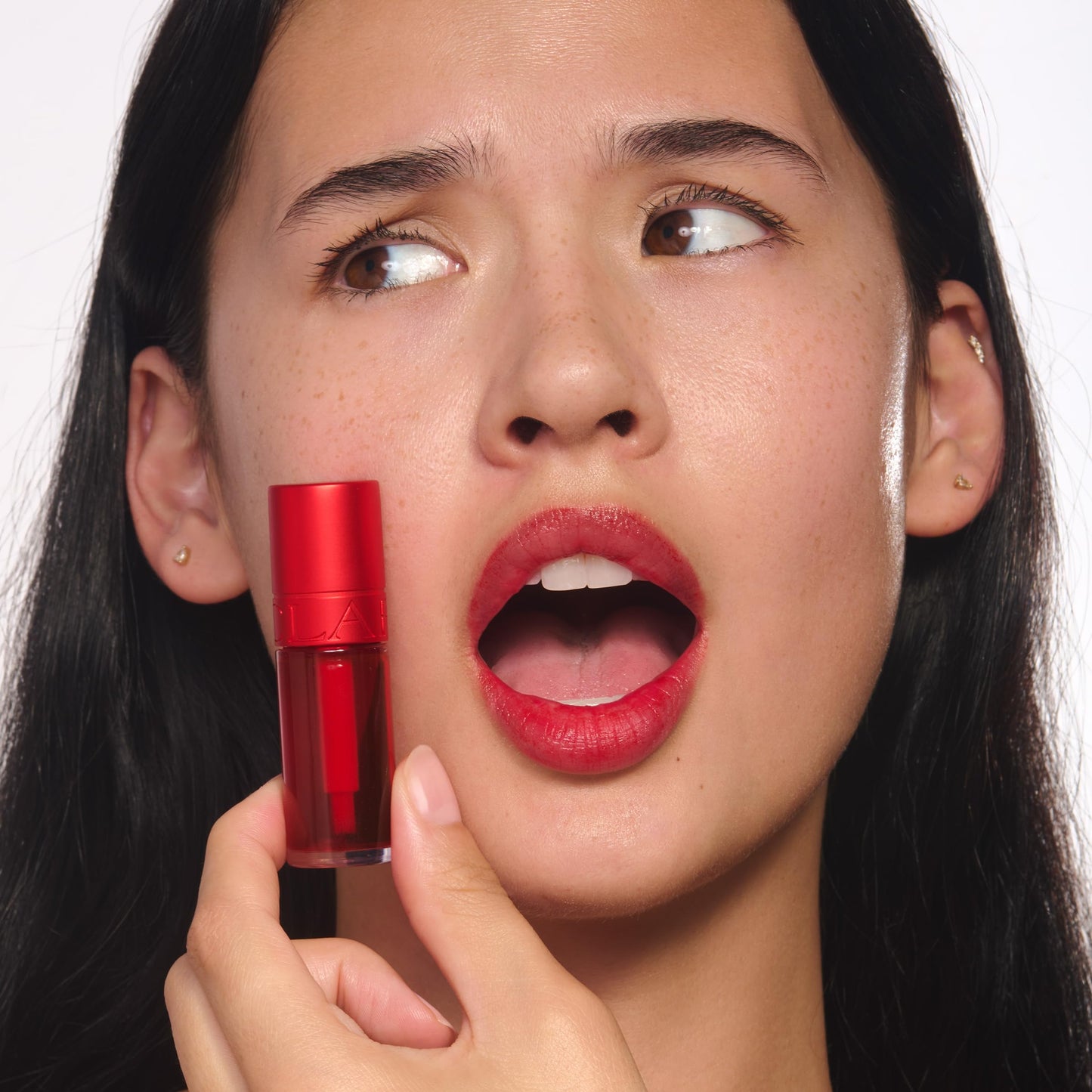 Clarins Water Lip Stain | Buildable Matte Finish | Kiss Proof, Transfer-Proof, Lightweight and Long Lasting | Contains Hyaluronic Acid | 0.2 Fluid Ounces, 03 Red Water
