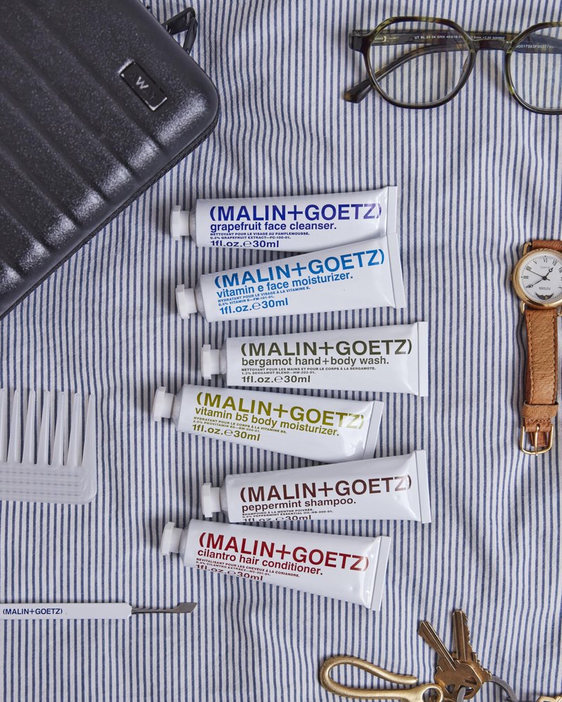 MALIN+GOETZ Best-Sellers Travel Kit | Six Everyday Essentials for Face, Body + Hair | Grapefruit Face Cleanser, Vitamin E Face Moisturizer, Peppermint Shampoo + More | Vegan, Travel-Friendly(6 x 1 oz)
